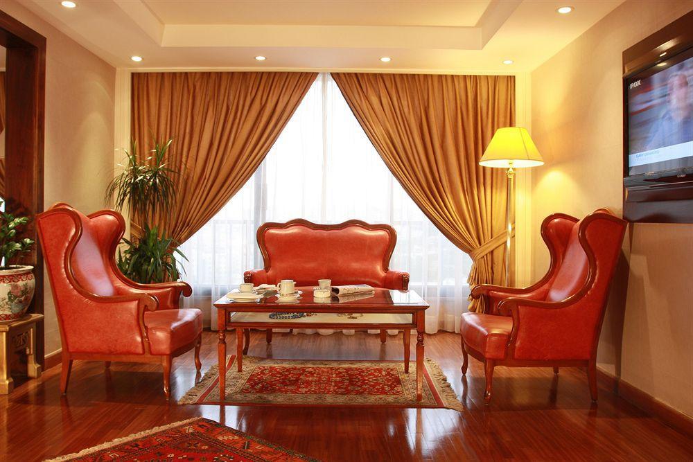 Regency Palace Amman Cameră foto A living room