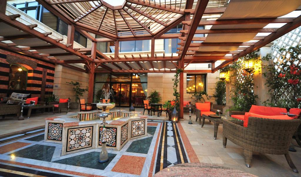 Regency Palace Amman Exterior foto The hotel's lobby